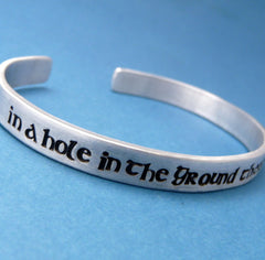 Tolkien Inspired - In A Hole In The Ground There Lived A Hobbit - A Hand Stamped Bracelet in Aluminum or Sterling Silver