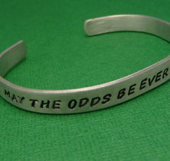 Hunger Games Inspired - May The Odds Be Ever In Your Favor -  A Hand Stamped Bracelet in Aluminum or Sterling Silver