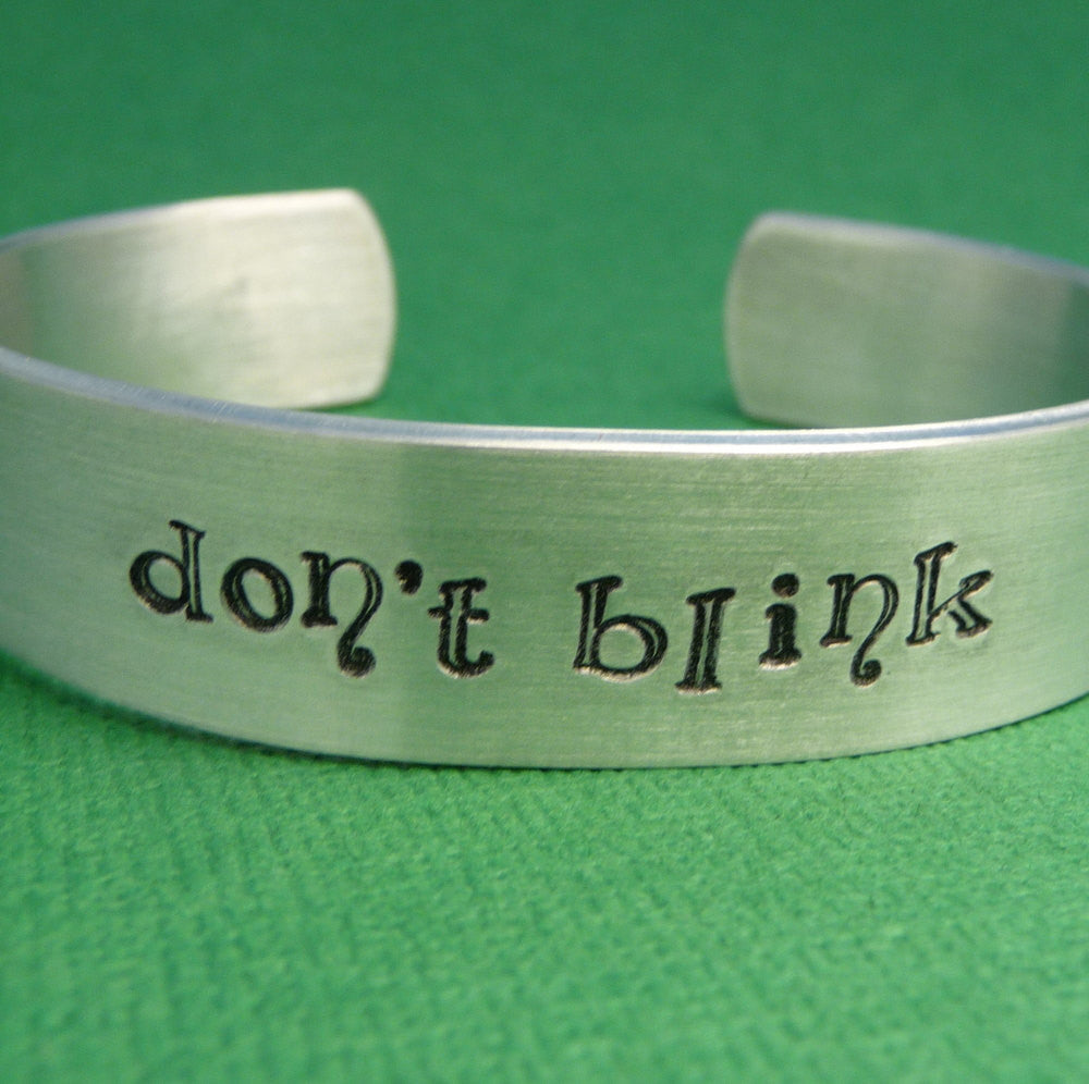 Doctor Who Inspired - Don't Blink - A Hand Stamped Aluminum Bracelet