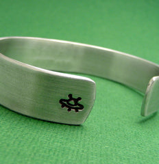 The X-Files Inspired - I Want To Believe. - A Hand Stamped Aluminum Bracelet